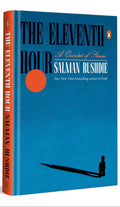 Book cover of 'The Eleventh Hour' by Salman Rushdie with a blue background and orange spine.