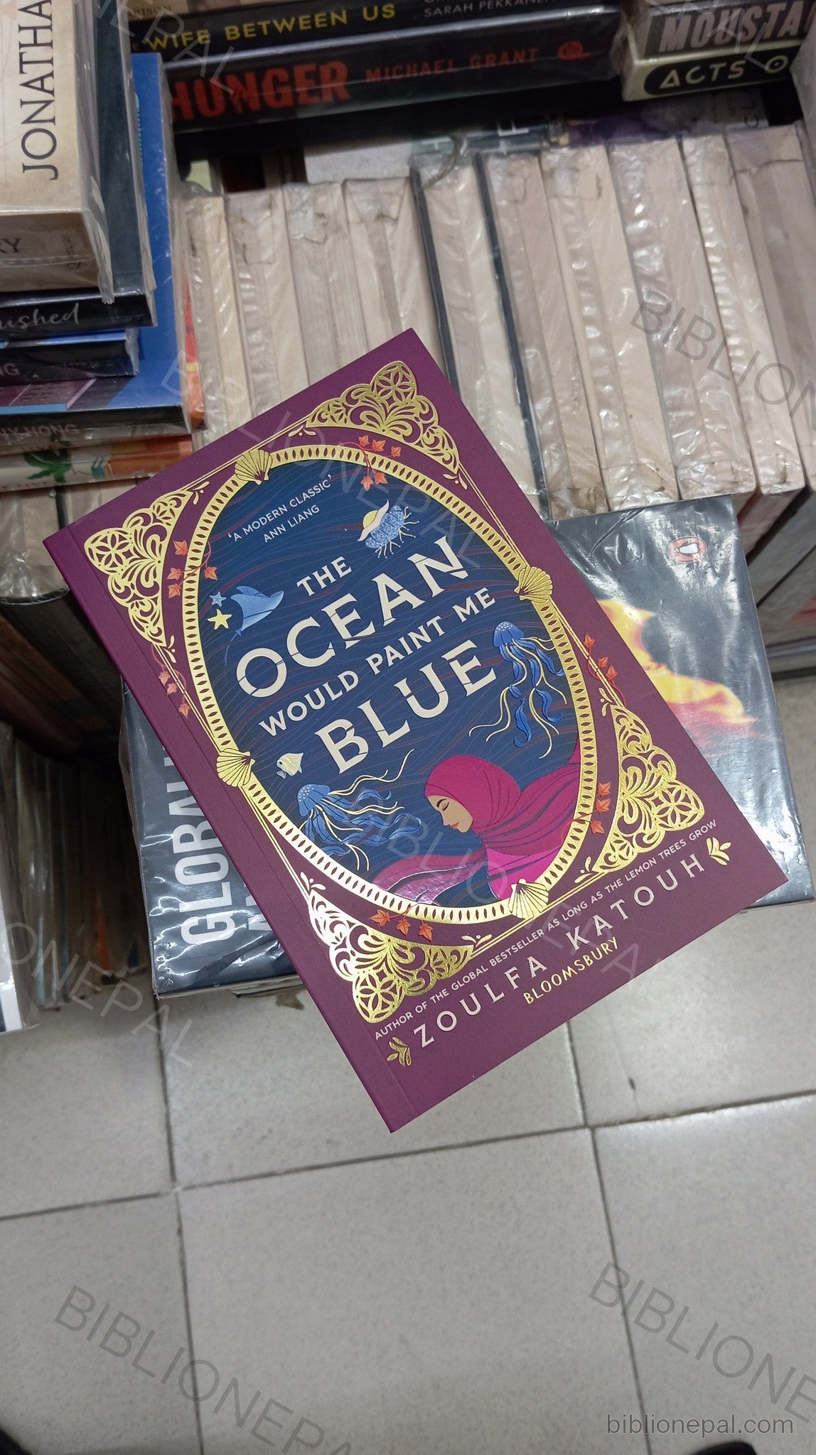 Photoshoot of The Ocean Would Paint Me Blue by Zoulfa Katouh